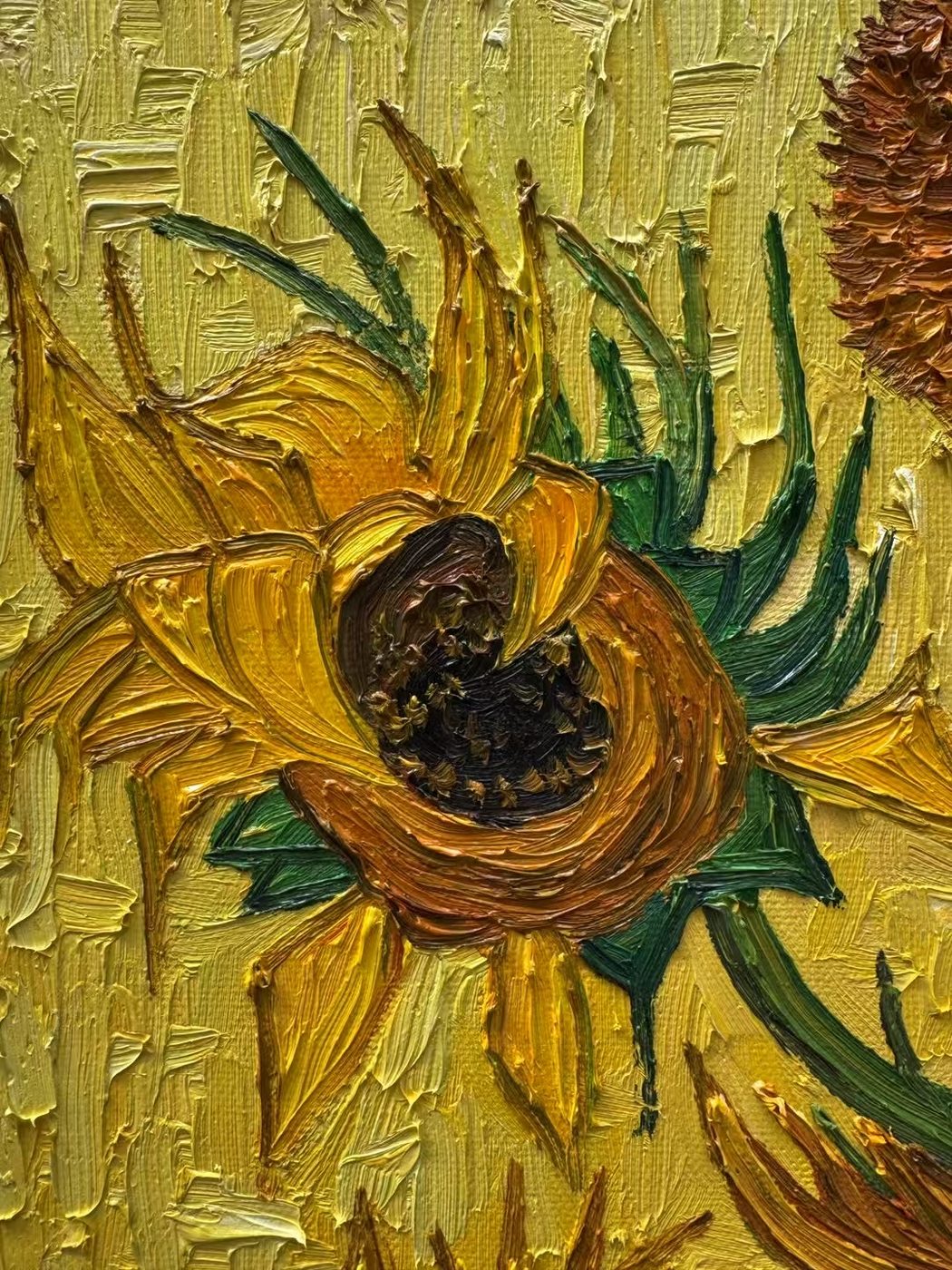 Macro detail of a Van Gogh-style sunflower showing thick impasto brushstrokes