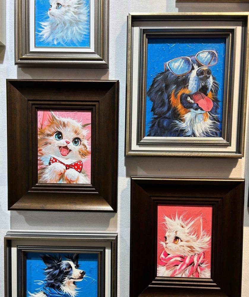Custom oil painting of a cat and a dog together in a single framed canvas — pets can be included in family portraits