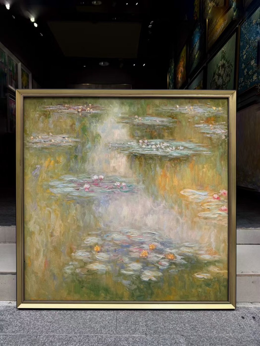 Hand-painted Monet Water Lilies reproduction in warm golden tones