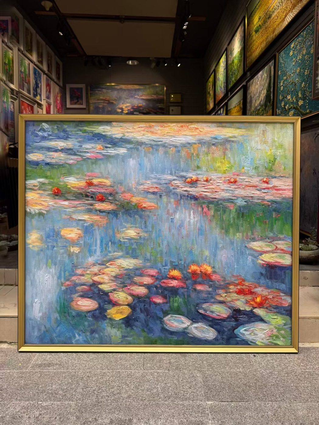Hand-painted Monet Water Lilies reproduction in deep red tones